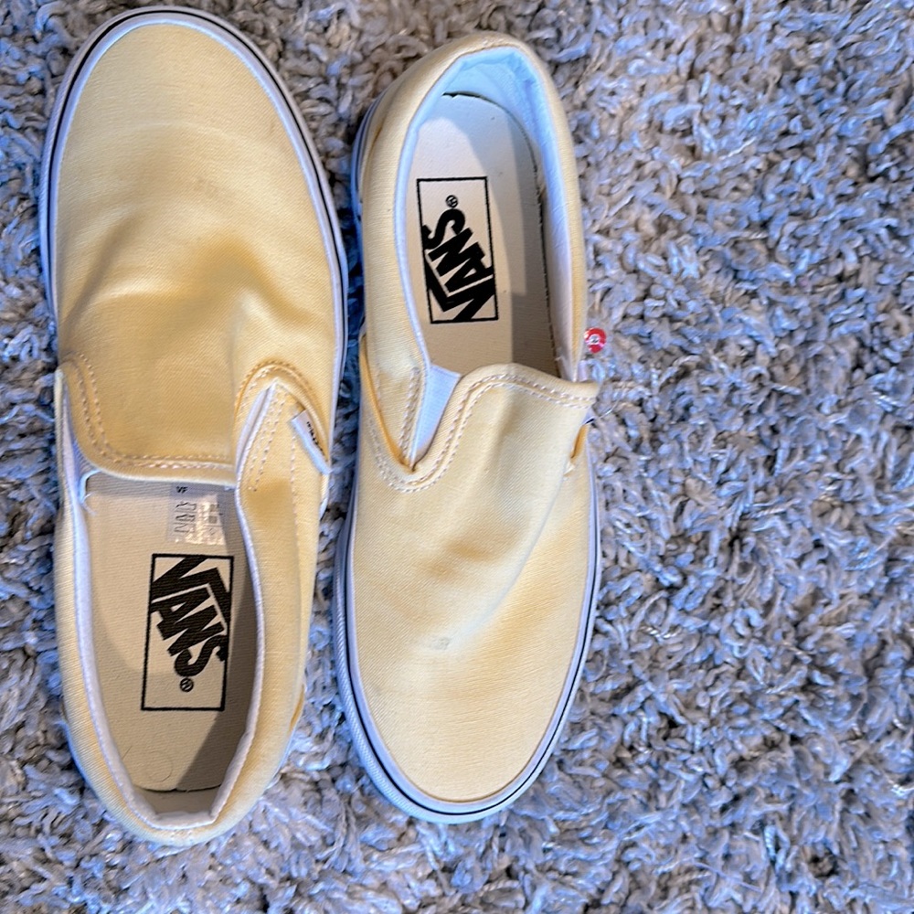 Yellow solid slip-on Vans